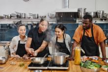 students training to be a chef in a cooking class 